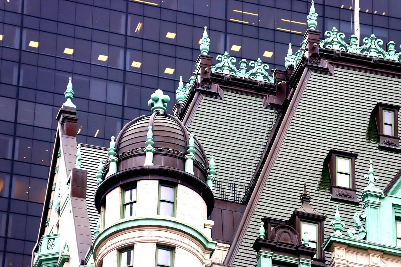 LOW ANGLE VIEW OF ILLUMINATED BUILDINGS AGAINST SKY