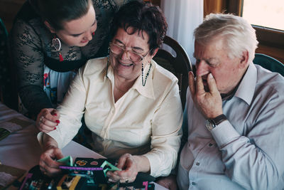 Group of people using mobile phone