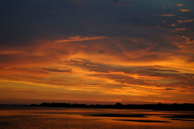 Scenic view of dramatic sky during sunset