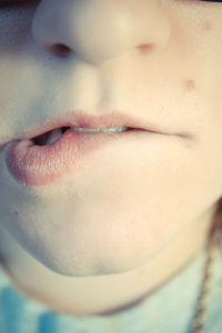 Close-up of young woman's mouth