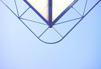 Low angle view of metal structure against sky