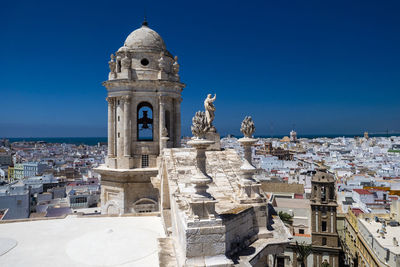 Exterior of buildings against clear blue sky