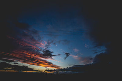 Low angle view of vapor trails in sky