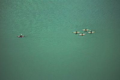 High angle view of people on boat sailing in sea