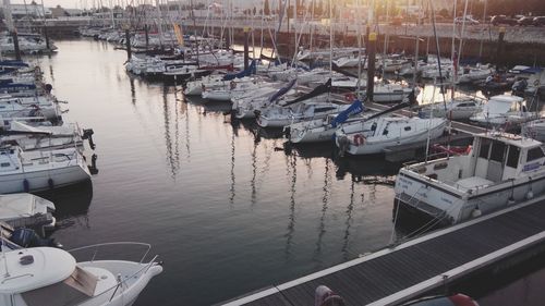 High angle view of boats moored at harbor