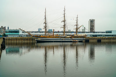 Ship moored at harbor