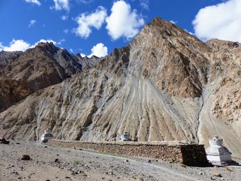 Panoramic view of rocky mountains against sky