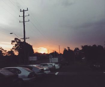 Car on road at sunset