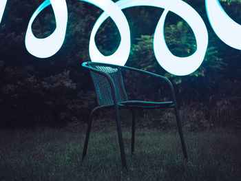 Empty chair in park