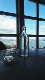 Close-up of glass window on table