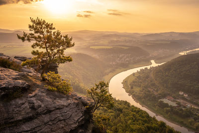 Scenic view of mountains against sky during sunset