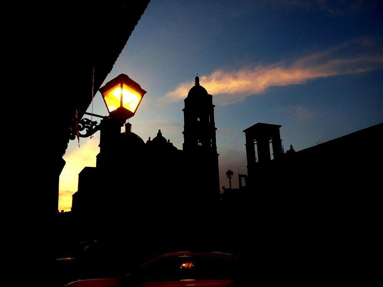 LOW ANGLE VIEW OF SILHOUETTE CITY AGAINST SKY