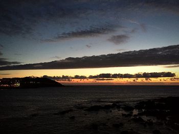 Scenic view of sea against sky at night