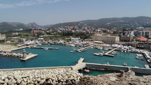 High angle view of sailboats in city