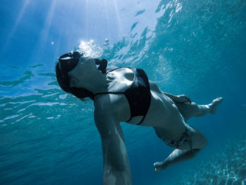 Man swimming in sea