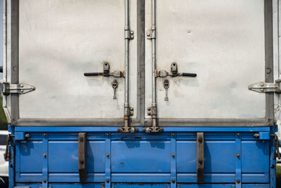 Close-up of pipes against blue sky