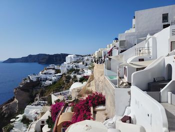 High angle view of townscape against clear blue sky