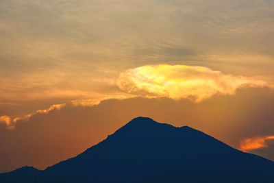 Low angle view of silhouette mountain against sky during sunset