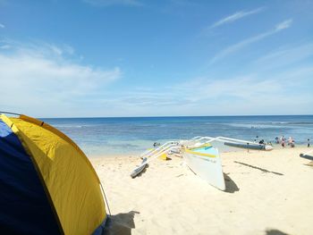 Scenic view of beach against sky