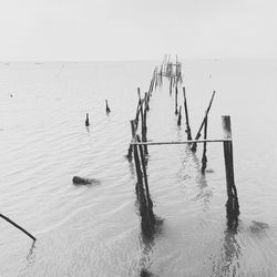 Ancient bridge or ruined palafitte in an old fishermen village on the water