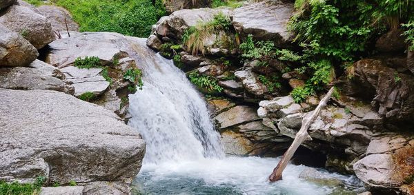 Scenic view of waterfall in forest