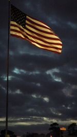 Low angle view of cloudy sky at sunset