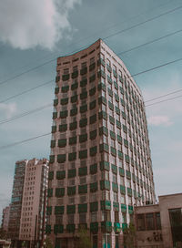 Low angle view of modern building against sky