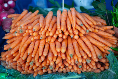 Close-up of carrots for sale at market stall