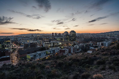 High angle view of townscape against sky during sunset