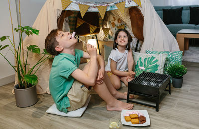 Kids doing barbecue at home