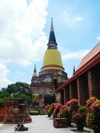 Temple against cloudy sky