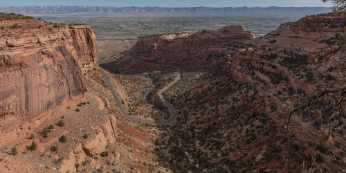 Full frame view of a box canyon in the colorado national monument with winding road below
