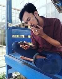 Young man eating food