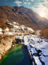 Scenic view of snowcapped mountains against sky