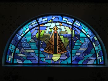 Low angle view of stained glass window