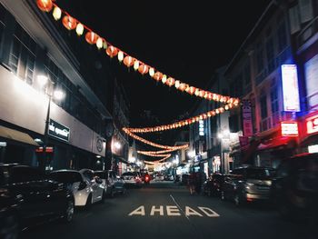 Traffic on city street at night