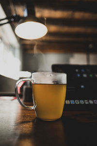 Close-up of coffee cup on table