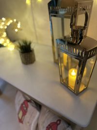 Close-up of christmas lights on table at home