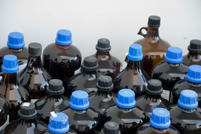 High angle view of various bottles on wall