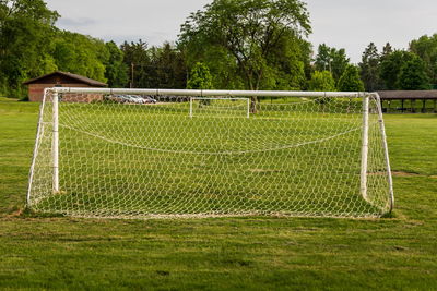 Scenic view of soccer field against sky