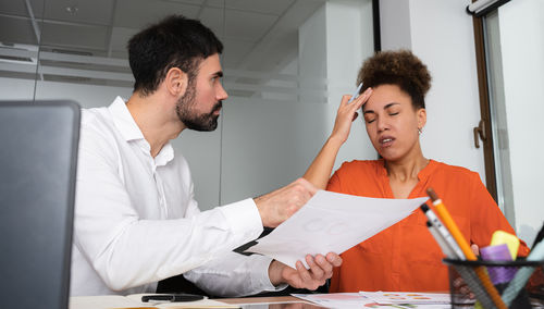 Business colleagues working at office