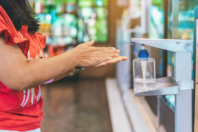 Close-up of hand holding ice cream cone