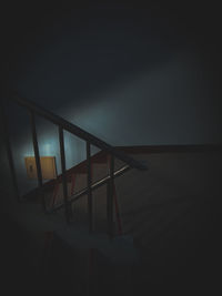 Low angle view of empty chair against sky