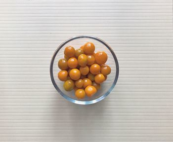 High angle view of fruits in bowl on table