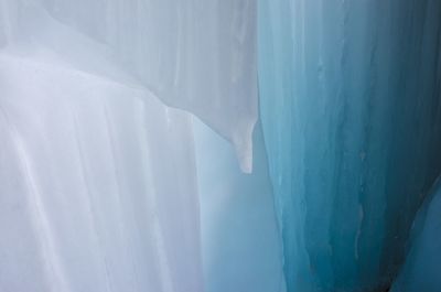 Scenic view of frozen landscape against sky