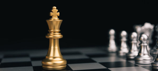 Close-up of chess pieces against blurred background