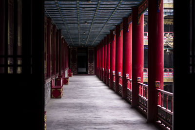 An empty corridor, chinese veranda with red pillars