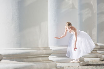 Dancing ballerina in the middle of the city