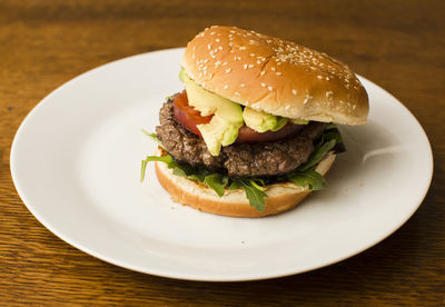 Close-up of burger in plate on table