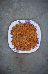 High angle view of coffee in plate on table